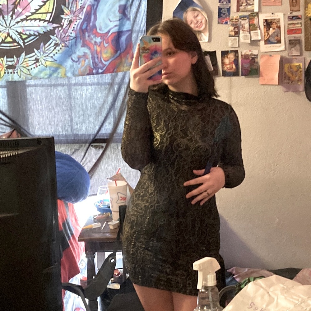 Only worn once. It fits like a medium